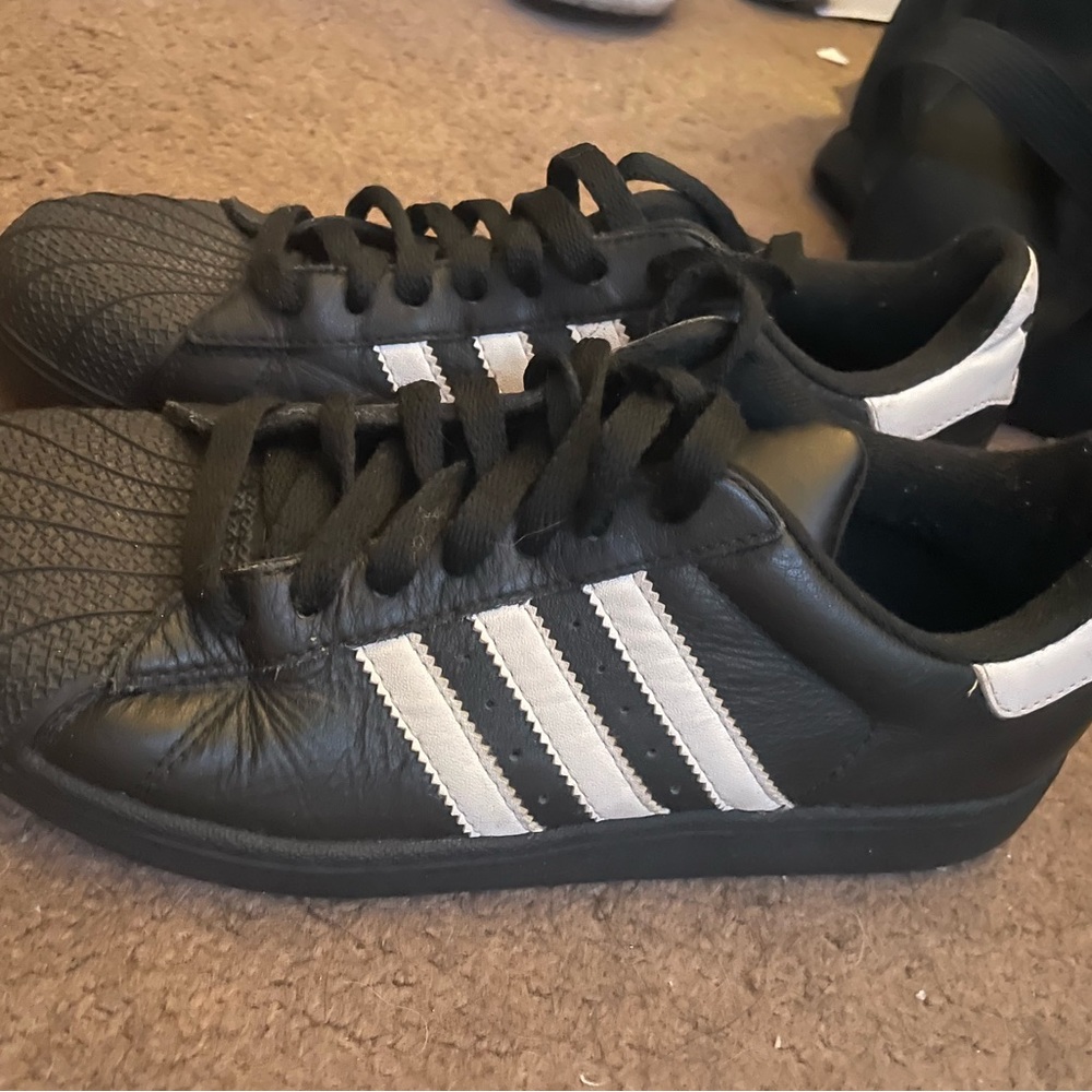 Black Adidas Superstars